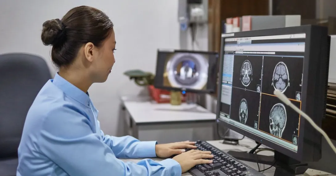 A radiologist examining an X-ray report